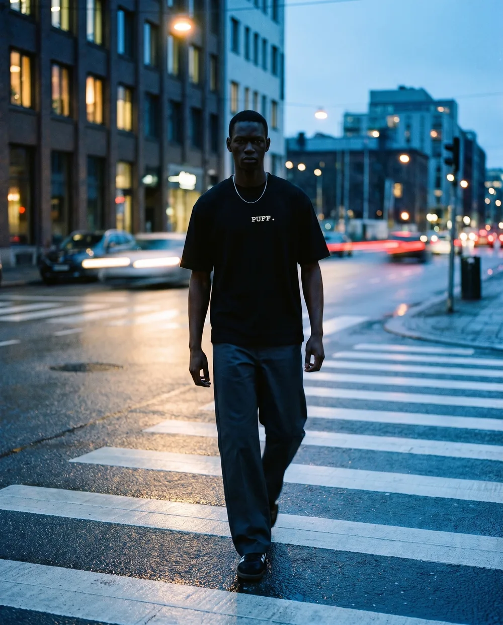 Crossing a city street at blue hour